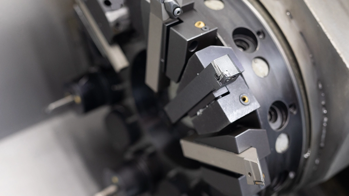 CNC turning of a stainless steel shaft on a numerically controlled lathe