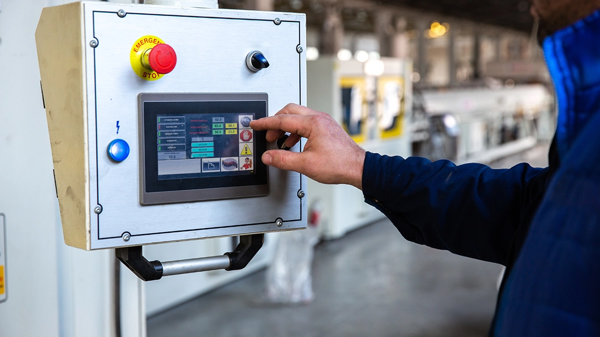 CNC machine operator panel with feed override dials