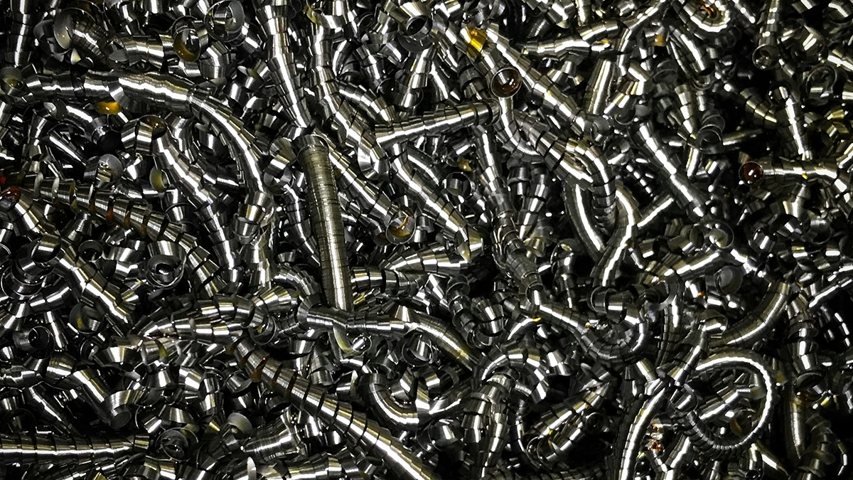 Close-up of spiral steel chips produced during machining